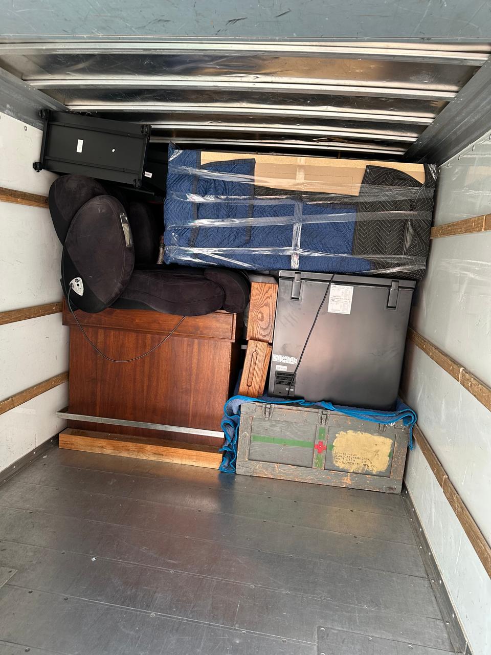 Professional movers loading a moving truck in Northern Virginia